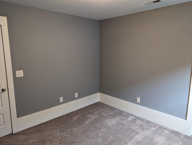 unfurnished room featuring carpet flooring