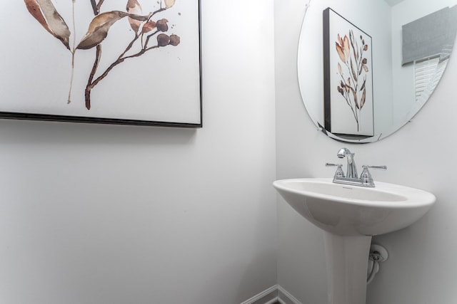 bathroom featuring baseboards