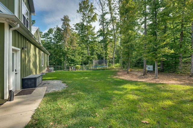 view of yard featuring a trampoline