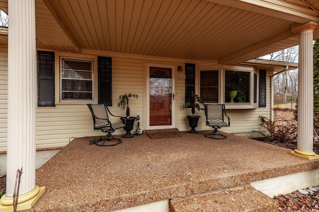 property entrance with covered porch