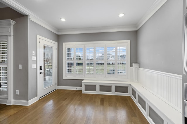 mudroom featuring crown molding and wood-type flooring