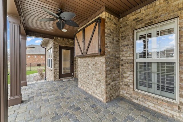 view of patio / terrace featuring ceiling fan