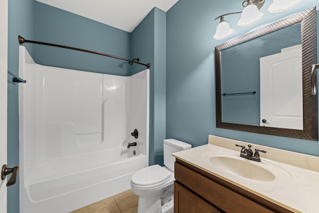 full bathroom featuring tile patterned flooring, vanity, shower / washtub combination, and toilet