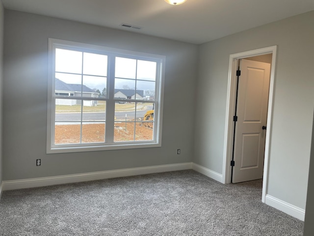 view of carpeted spare room