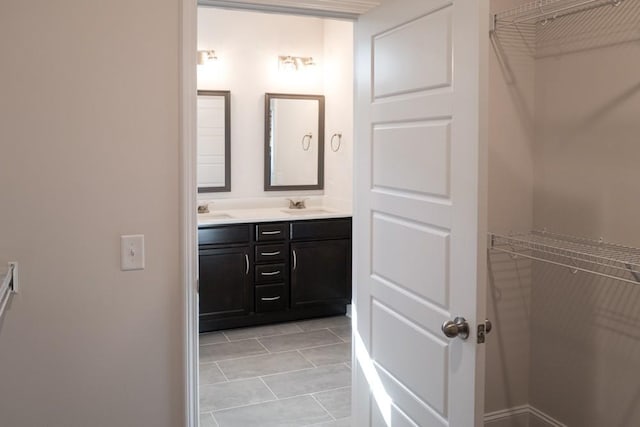 bathroom featuring vanity and tile patterned flooring