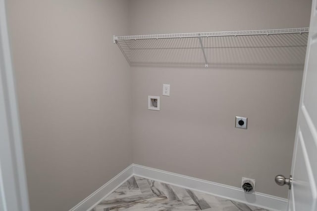 washroom with hookup for an electric dryer and hookup for a washing machine