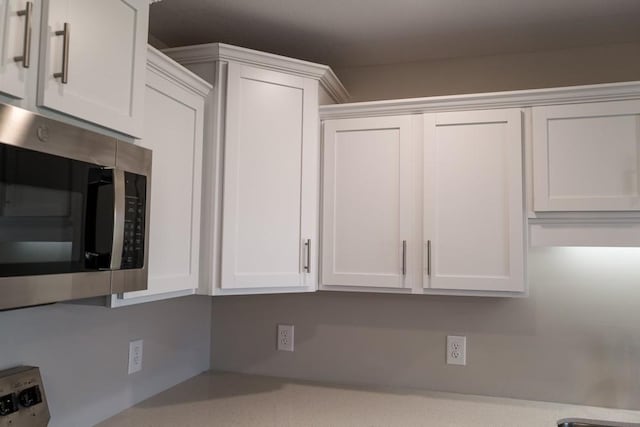 kitchen with white cabinets