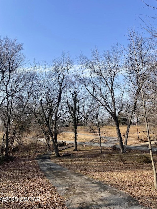 view of road featuring a rural view