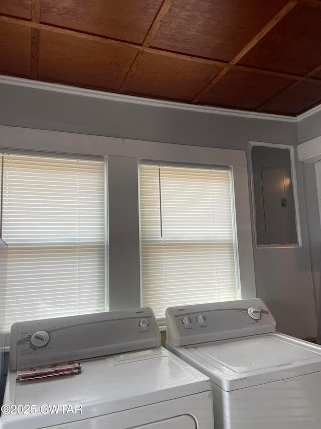 laundry area featuring electric panel and washer and dryer