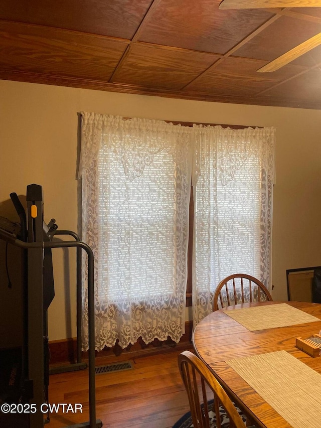dining space featuring hardwood / wood-style flooring