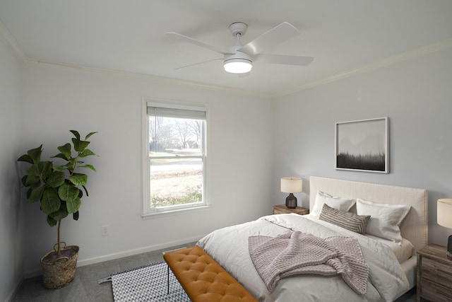 bedroom with ornamental molding, ceiling fan, and carpet flooring