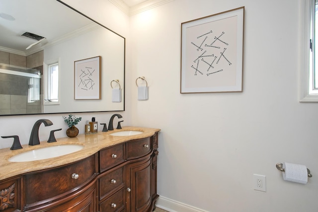 bathroom featuring walk in shower, ornamental molding, and vanity