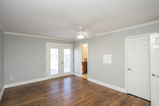 spare room with dark hardwood / wood-style flooring, ceiling fan, crown molding, and french doors