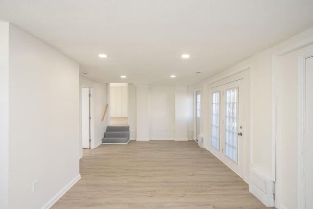 hallway featuring light wood-type flooring