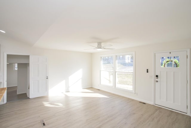 foyer featuring ceiling fan and light hardwood / wood-style flooring