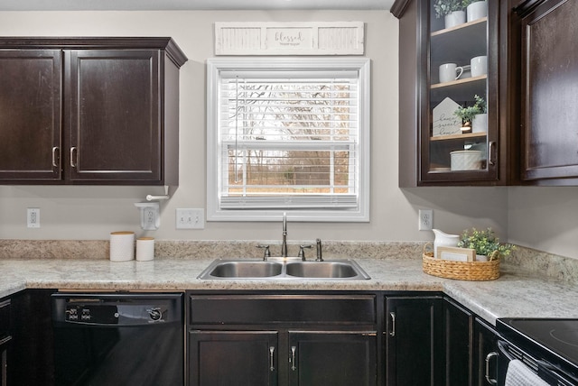 kitchen with sink, dark brown cabinets, and dishwasher