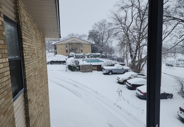 view of yard covered in snow