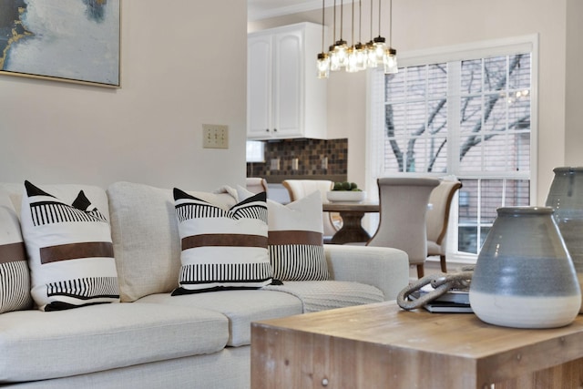 living room with an inviting chandelier