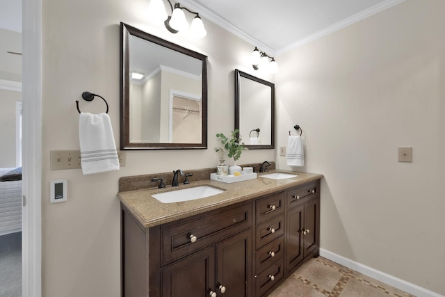 bathroom featuring vanity and ornamental molding