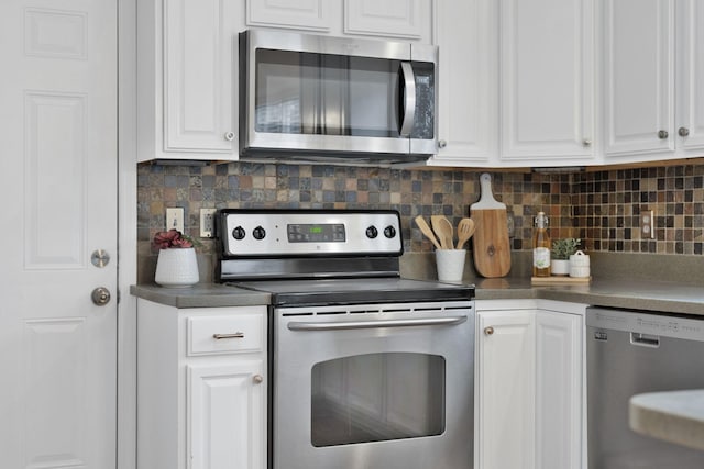 kitchen featuring backsplash, white cabinets, and appliances with stainless steel finishes