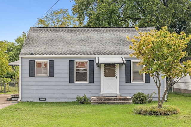 bungalow with a front yard