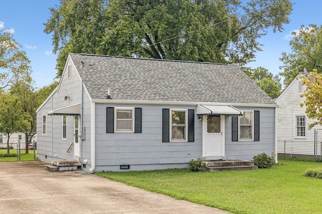 bungalow with a front yard