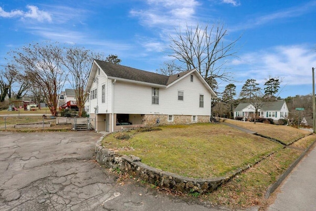 view of property exterior featuring a yard