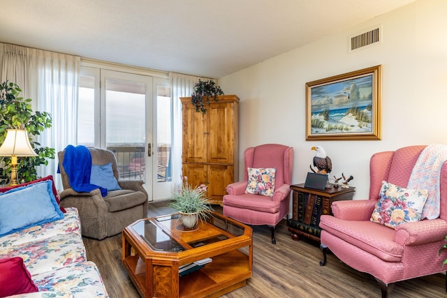 living room with dark hardwood / wood-style flooring