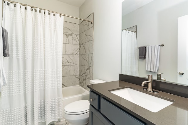 full bathroom featuring shower / tub combo, vanity, and toilet