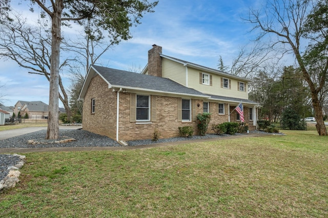 view of front of property with a front lawn