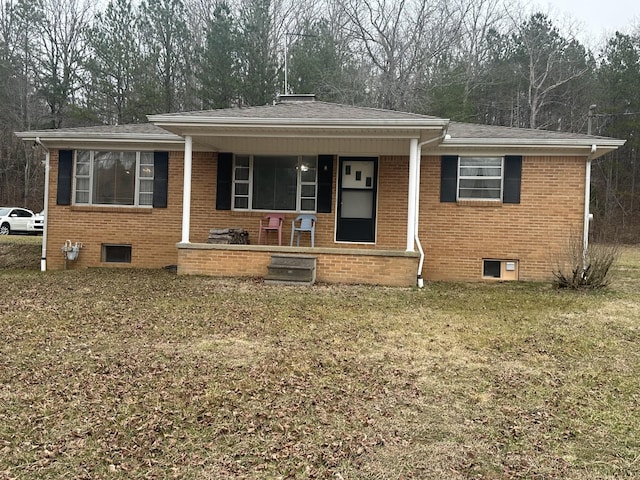 view of front of house with a porch and a front yard