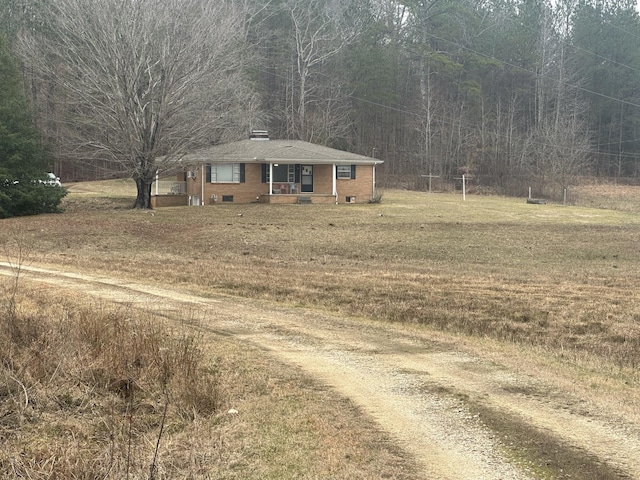 view of front of home with a front lawn