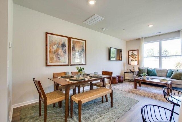 dining room featuring wood-type flooring