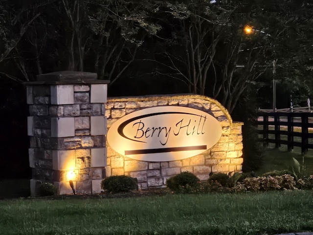 community sign with fence