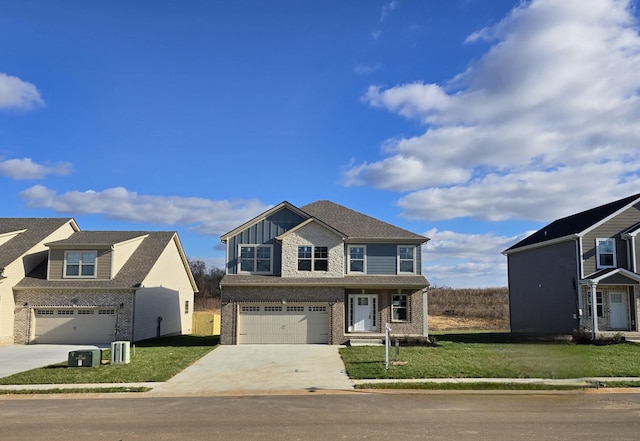 view of front of home with a garage and a front yard