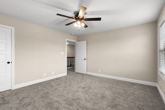 unfurnished bedroom with carpet floors and ceiling fan