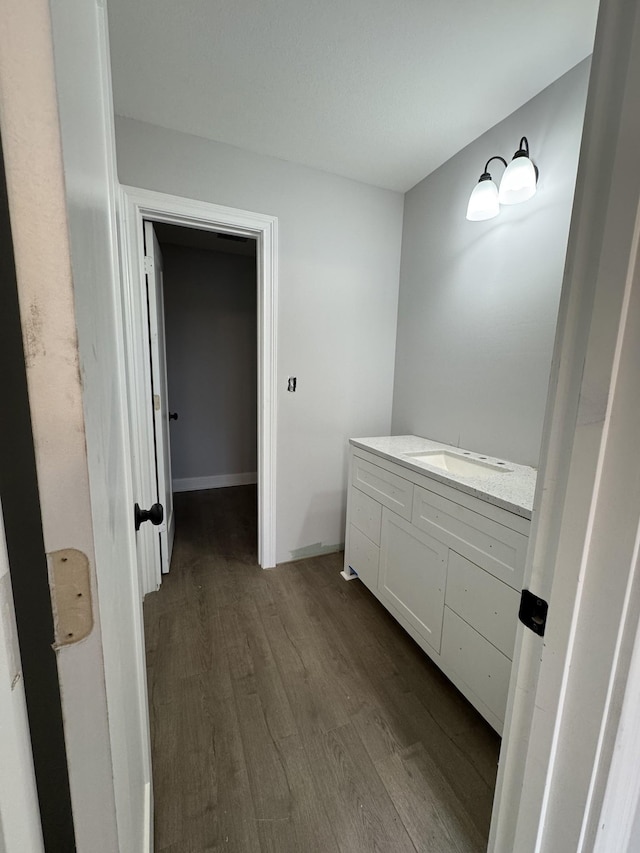 bathroom featuring sink and hardwood / wood-style flooring