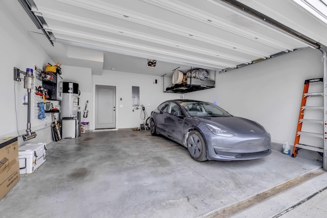 garage featuring a garage door opener and electric panel