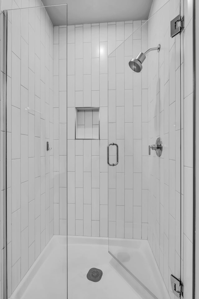 bathroom featuring an enclosed shower