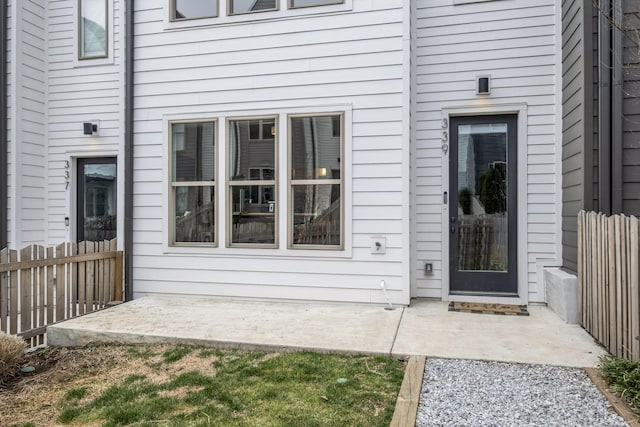 entrance to property featuring a patio area