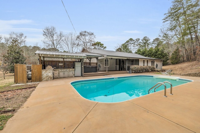 view of pool featuring a patio