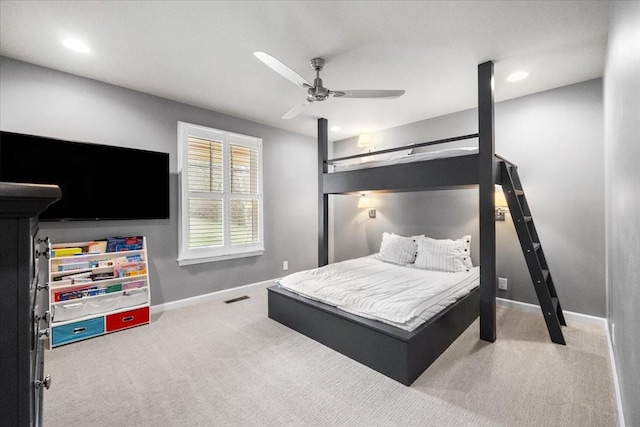 carpeted bedroom with ceiling fan