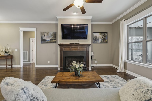 living room featuring crown molding, dark hardwood / wood-style floors, and ceiling fan