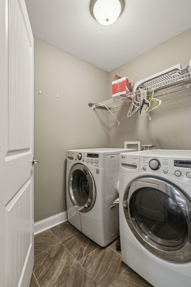 laundry room with washing machine and dryer