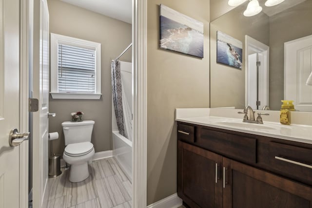 full bathroom with vanity, toilet, and shower / tub combo