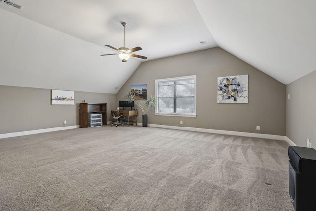 bonus room with vaulted ceiling, light colored carpet, and ceiling fan