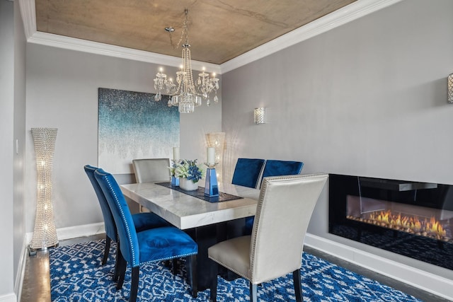 dining room featuring crown molding, dark wood-type flooring, and a chandelier