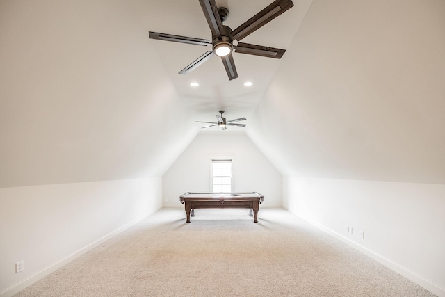 interior space featuring ceiling fan, recessed lighting, baseboards, vaulted ceiling, and carpet