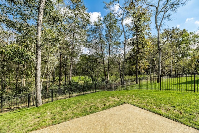 view of yard with a patio and fence