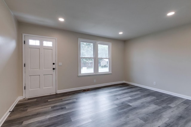 entryway featuring dark wood-type flooring